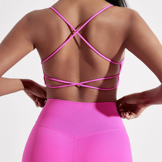 Ropa interior de yoga y gimnasio de color sólido para mujer, sujetador de fitness con tirantes cruzados en la espalda, top deportivo ajustado de alta resistencia y almohadilla para el pecho.